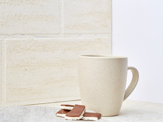 Cup of coffee and chocolate isolated on the white background, close-up.