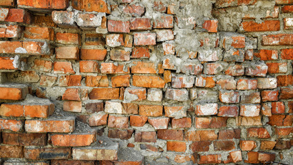 Very old brick wall. Old collapsing brick wall. Old building. Old brick wall texture background