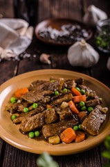 Pork medallions with vegetable and soy garlic sauce