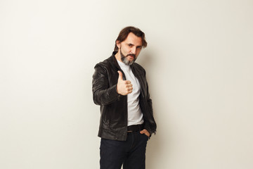 Confident man with thumb up portrait