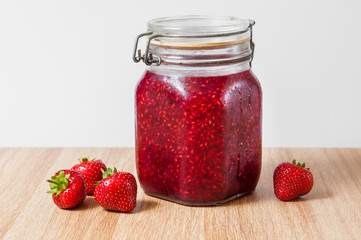 raspberry jam in jar isolated