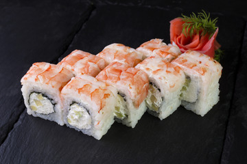 Shrimp roll on a dark background