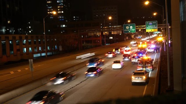 Time lapse of Traffic trying to get around an accident on a highway near urban city - medium shot