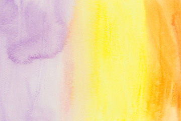 abstract watercolor background in purple, yellow and orange