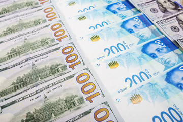 Obraz premium Israeli and American banknotes. Shekel and American dollars.