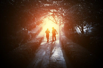 Two friends walking and talking on the path to paradise