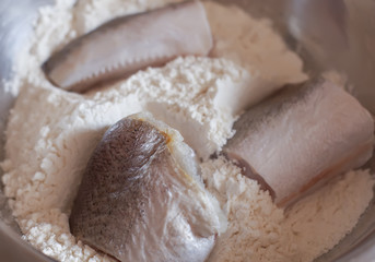 Fresh raw fish on a kitchen board