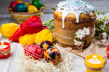 Congratulatory easter background with cake and eggs ready for celebrations