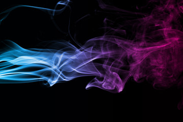 Abstract blue and pink smoke on a dark background.