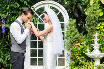 The Groom show love in garden.