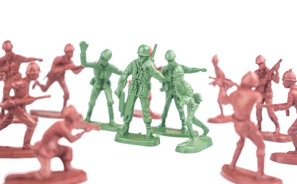 Figures of soldiers with weapons in battle on a white background. Isolated.