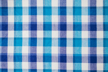 Background of fabric in a blue cage.