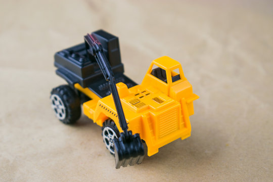 Construction machinery. A toy excavator.