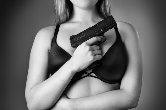 woman holding gun