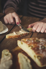 ciabatta - bread with olives on a wooden surface