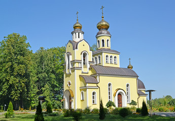 Fototapeta na wymiar Church of the Holy Apostles Peter and Paul in summer day. Zheleznodorozhny, Kaliningrad region