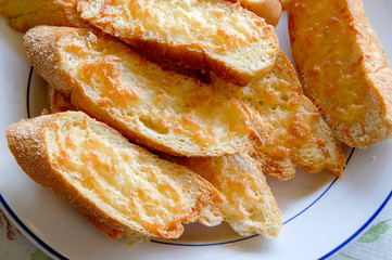Garlic bread fresh from the oven. The bread just taken out of the oven look crispy and delicious.