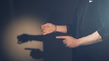 The disappearance trick of a diamond in the hands of a magician.