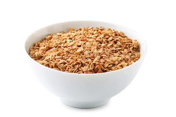 Tasty granola in bowl isolated on white background