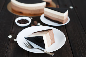 Triple chocolate layer mousse cake with glaze