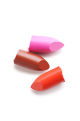 Colorful lipsticks on a white background