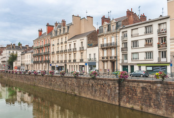 Fototapeta premium View on beautiful embankment of River Vilaine decorated with flowers in Rennes, Brittany, France