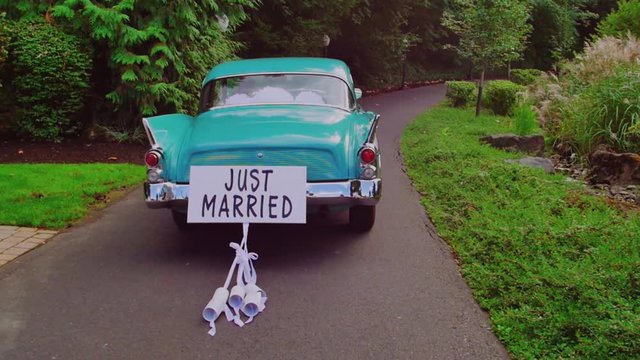 Just Married Car Driving Away Slow Motion