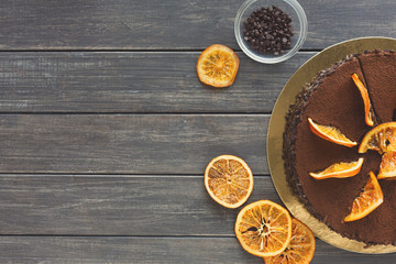 Chocolate cake with cream and profiterole