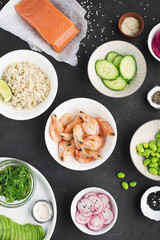 Fresh ingredients for poke bowl. Top view.