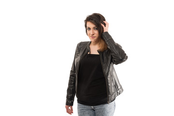 Woman in a leather jacket isolated on white