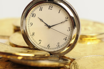 bitcoins with a pocket watch