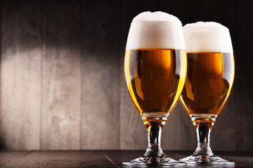 Composition with two glasses of lager beer