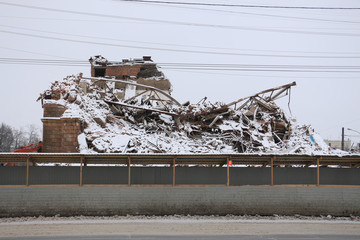 a ruined building, covered with snow
