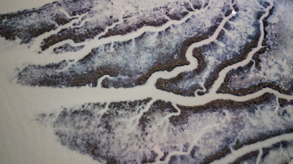 Drone view of a spectacular delta where a river flows into the sea