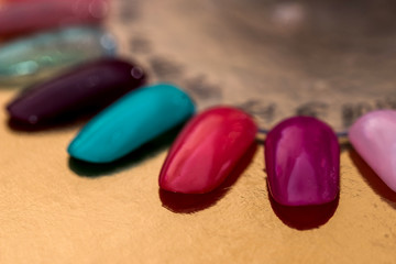 Obraz na płótnie Canvas samples of colors of false nails
