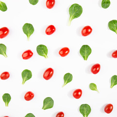 Pattern of basil leaves and tomatoes