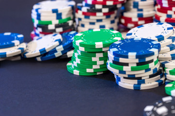 Poker chips isolated on black background