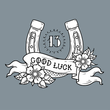 Tattoo gold horseshoe with flowers, mystical number 13 and ribbon with lettering Good Luck.