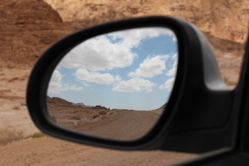 Desert in the car mirror