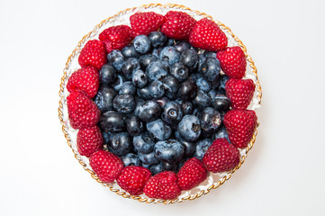 fresh blueberry and rasberry on white background