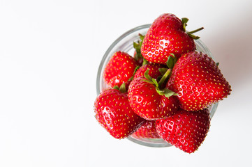 Fresh ripe strawberry in a glass