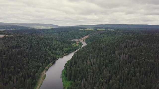 Gorgeous aerial panoramic view on the touristic part of the river at sunset. Clip. Beautiful natural landscape at summer. Europe