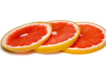 Fototapeta na wymiar Grapefruit slices isolated on the white background