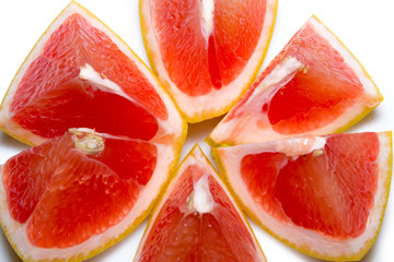 Grapefruit slices isolated on the white background
