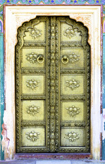 Naklejka premium Copper Door in the City Palace of Udaipur, India