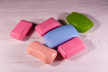Pieces of the soap on wooden table