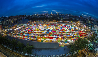 Multi colour Rod Fai night Market at sunset, located in Ratchada area of Bangkok, Thailand