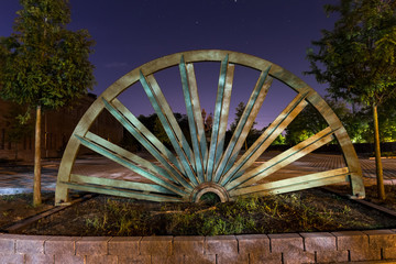 mining tower wheel at night