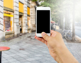 taking a photo at the street