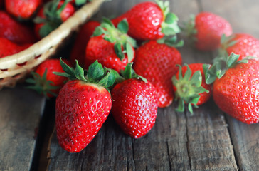 fresh strawberries on a wooden background
